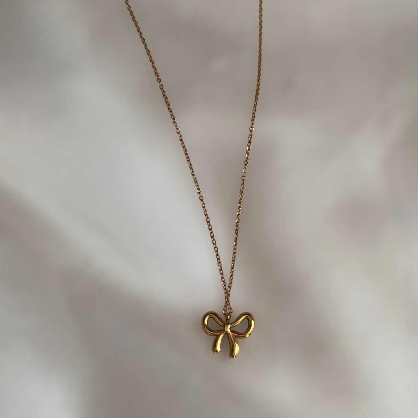 Collier noeud dorée